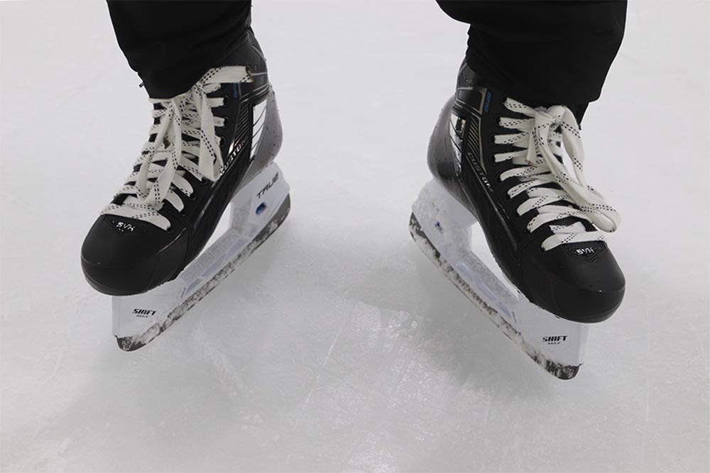 Skates pictured on ice.