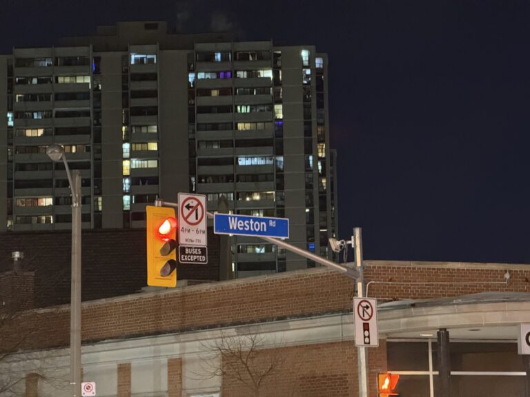 Traffic sign reading Weston Road